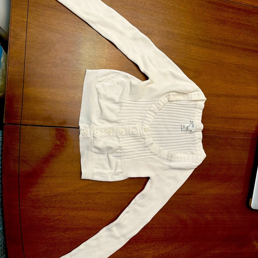 Long sleeve, short white XS white sweater with buttons.
